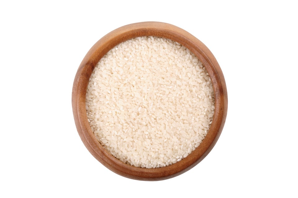 broken rice in a wooden bowl.